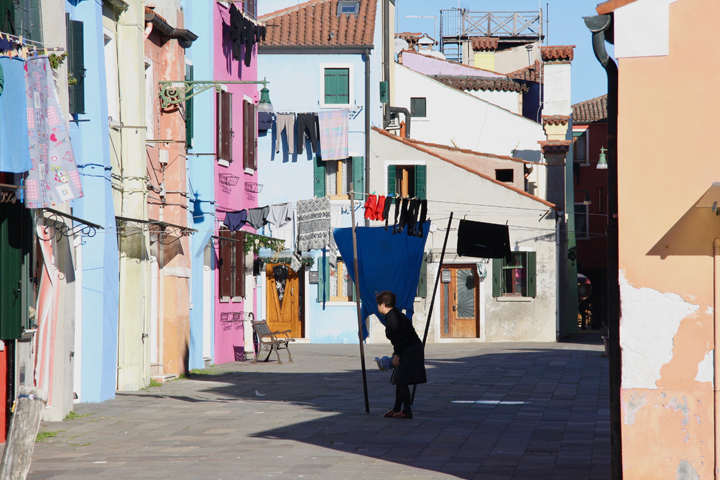 Typical colorful houses and laundry on the island of Burano