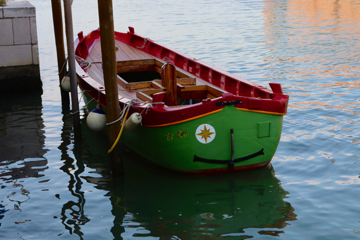 A restored wooden "topo" outside the boatyard run by Venice On Board